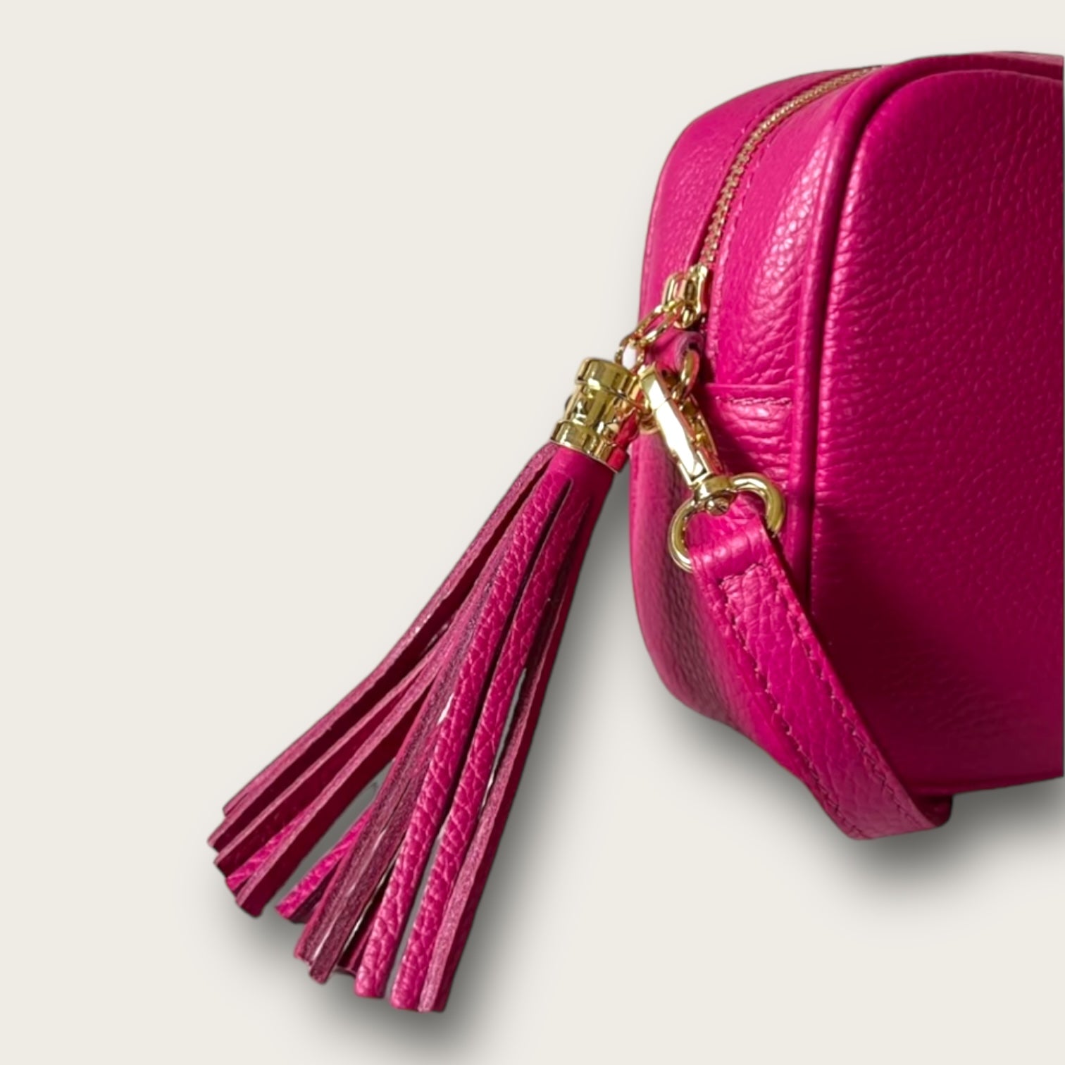 LOLA MAGENTA tassle bag